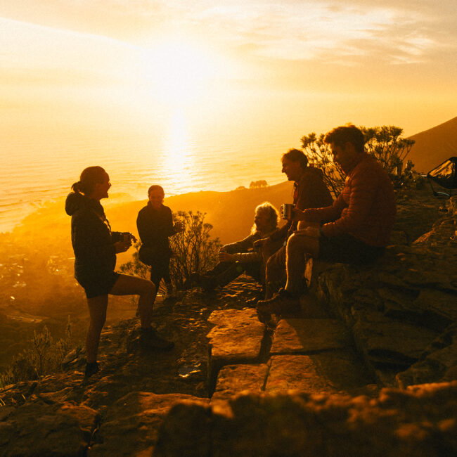 hikers enjoying the sunset view