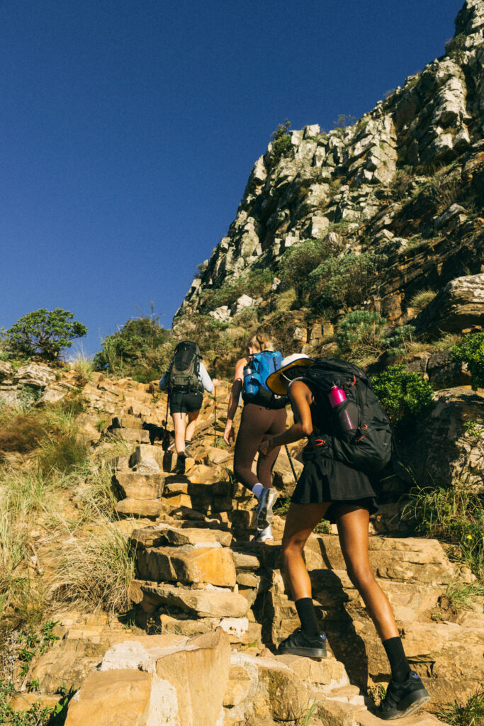 three hikers on lion's head