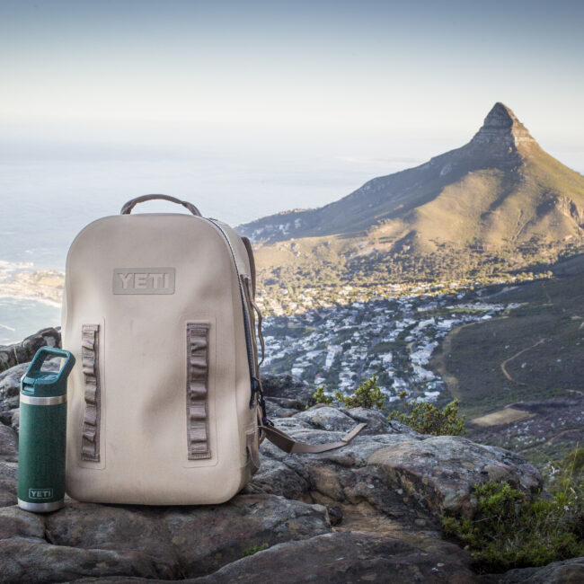 hiking backpack on mountain with water bottle cape town