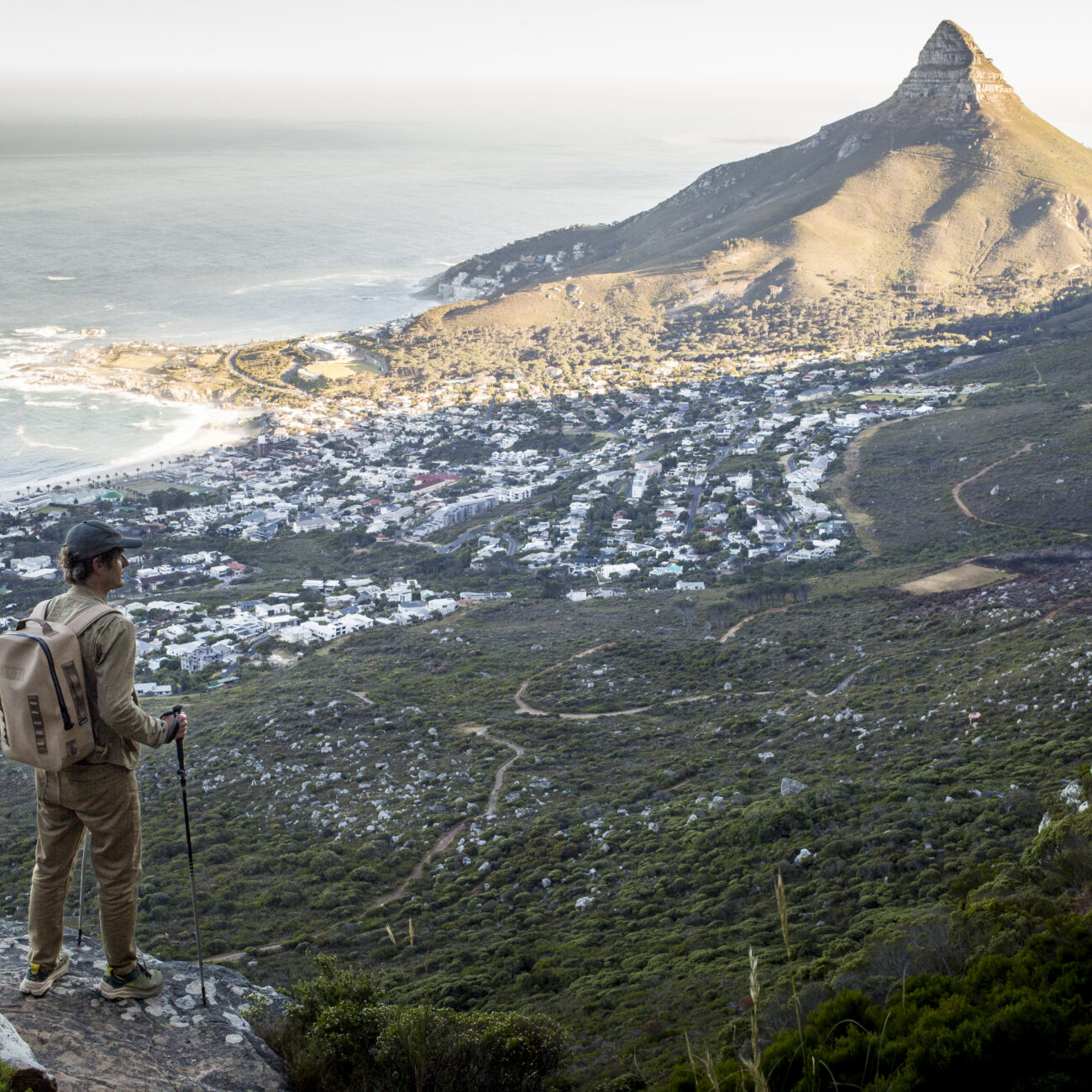 hiker standing on Table Mountain look out point looking towards Lion's Head